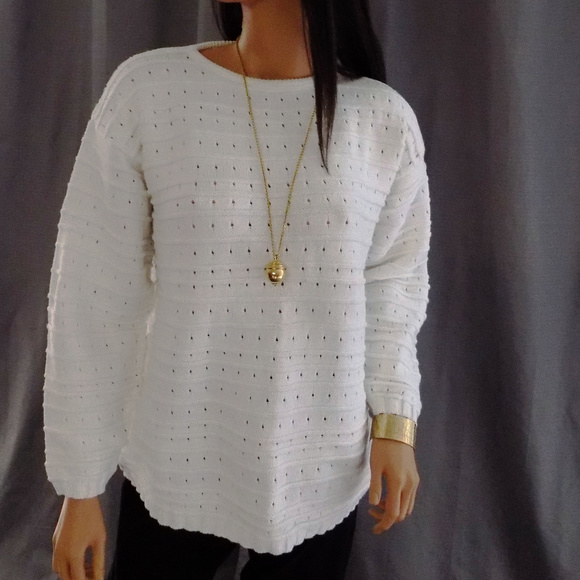 A Knitch Above Sweaters - Sweater